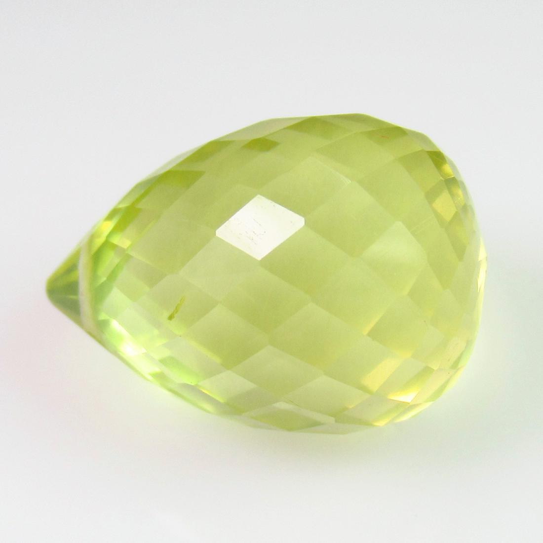 15.81 Ct Natural Lemon Quartz 17X12 mm Pear Drop: No Reserve! Title: 15.81 Ct Natural Lemon Quartz 17X12 mm Pear Drop Stone Clarity: VVS Gemstones: Natuarl Lemon Quartz Carat Weights: 15.81 Size/Dimensions: 17.10 x 12.10 x 12.10 mm Additional Informa