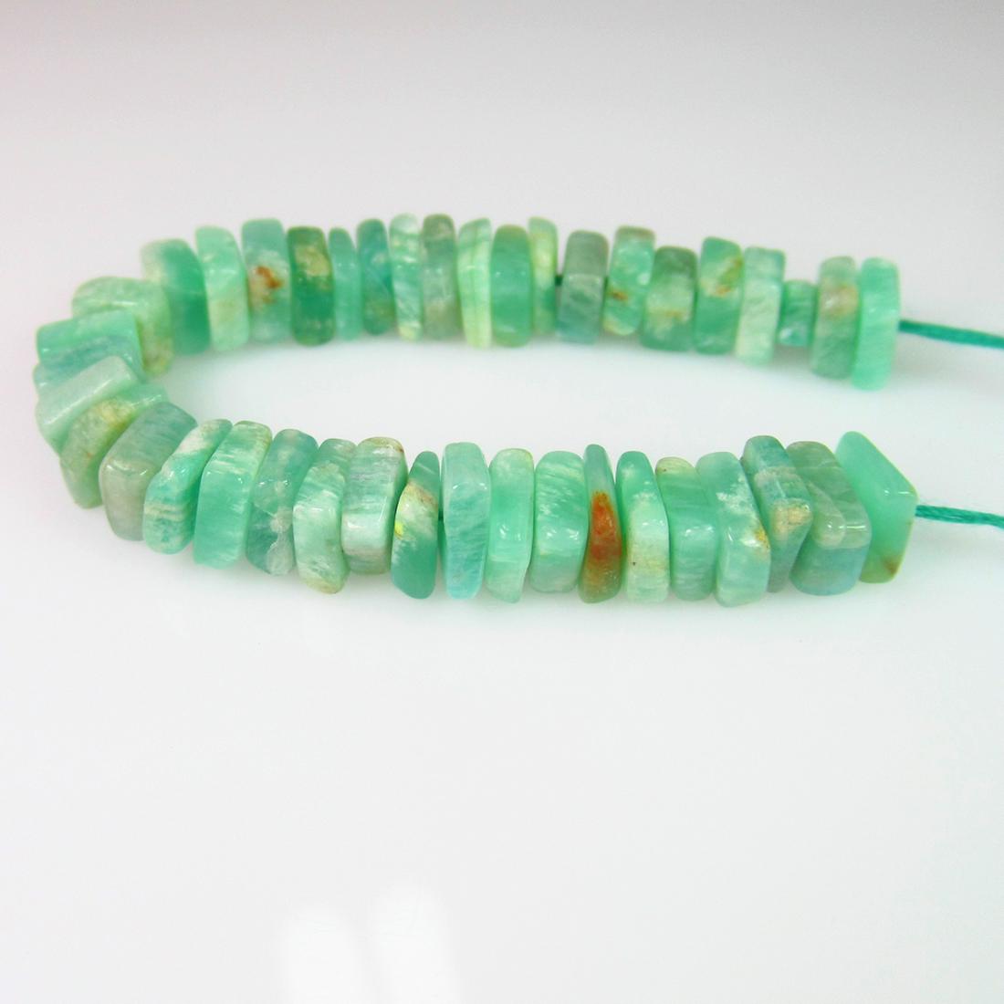 20.89 Ct Genuine 41 Drilled Amazonite Square Flat Beads: No Reserve! Title: 20.89 Ct Genuine 41 Drilled Amazonite Square Flat Beads Stone Clarity: Transparent Gemstones: Natural Amazonite Beads Carat Weights: 20.89 Size/Dimensions: 3.5x3.5 to 5.2x5.2 mm / 4