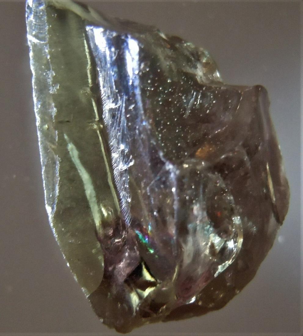 11.9 CT COLOR CHANGE ALEXANDRITE - UNTREATED GEMSTONE: Title: 11.9 CT COLOR CHANGE ALEXANDRITE - UNTREATED GEMSTONE Origin: Carnaiba Mining Dist. Pindobacu, Bahia, Brazil Size: 1.6x1.2x1 cm / 2.38 gram Description: purple and green alexandrite with some c