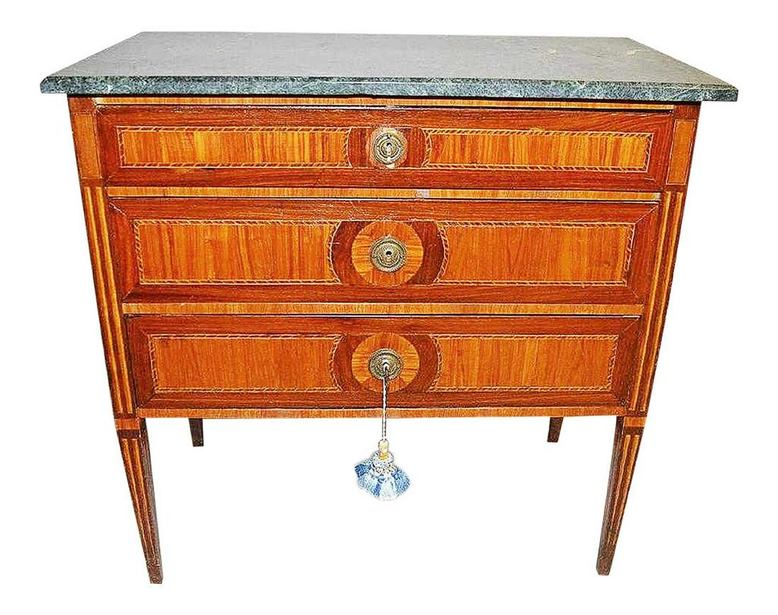 19th Century French Directoire Commode Dresser: Stunning and simple for today's modern homes, a fully parquetry inlaid with 5 wood types. 19th century French Directiore-style 3 drawer commode, newer marble top, dore' bronze hardware. 33?W × 18?D �