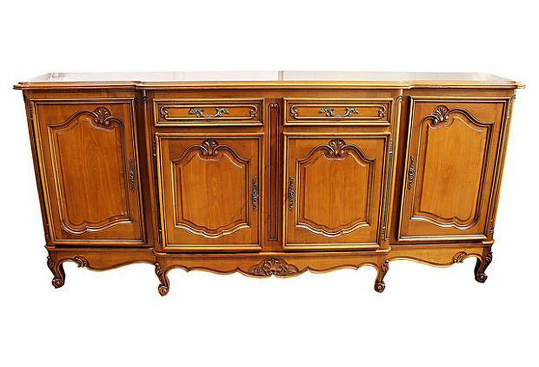 French Four-Door Cherry Buffet: Louis XV-style, solid cherry, hand-carved, French buffet. Features parquetry top, serpentine sides and satin amber cherry color. Brass hardware, with four keys for four key operated doors, and two dra