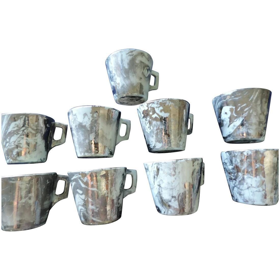 Sascha Brastoff Turquoise and Platinum Surf Ballet: This is a set of 9 Mugs, made by, and signed, Sascha Brastoff. They are part of the Surf Ballet set, in the Turquoise and Platinum finish. If you need a set of mugs in your vintage bar, dining room, m