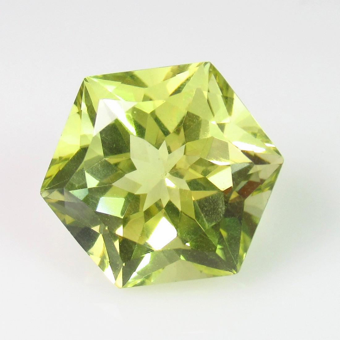 9.75 Ct Natural Lemon Quartz 15X13 mm Hexagon Cut: No Reserve! Title: 9.75 Ct Natural Lemon Quartz 15X13 mm Hexagon Cut Stone Clarity: VVS Gemstones: Natuarl Lemon Quartz Carat Weights: 9.75 Size/Dimensions: 15.00 x 13.10 x 9.90 mm Additional Informat