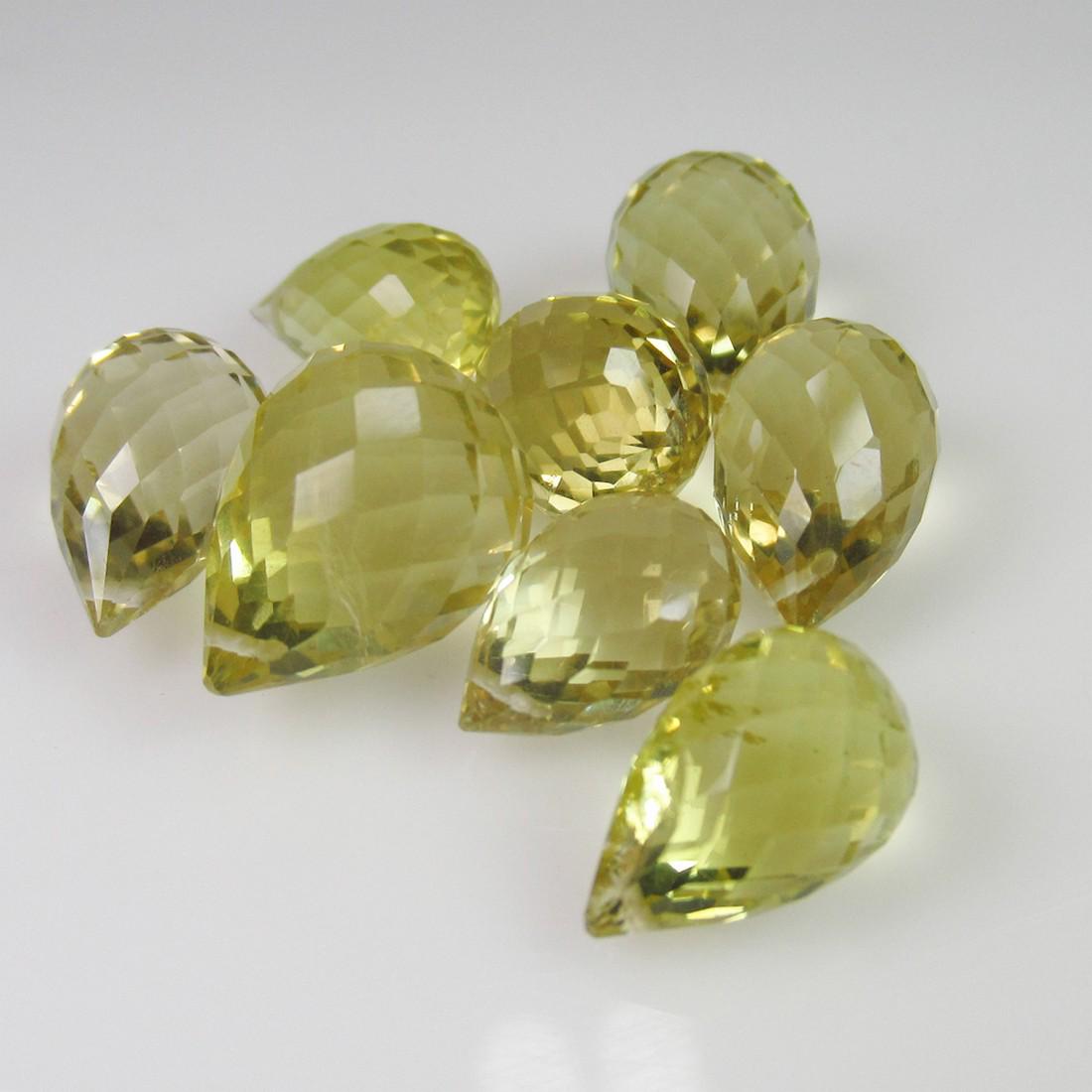 31.23 Ct Natural 8 Drilled Lemon Quartz Briolette Beads: No Reserve! Title: 31.23 Ct Natural 8 Drilled Lemon Quartz Briolette Beads Stone Clarity: Transparent Gemstones: Natuarl Lemon Quartz Beads Carat Weights: 31.23 Size/Dimensions: 10.0x7.0 to 12.3x9.6 m