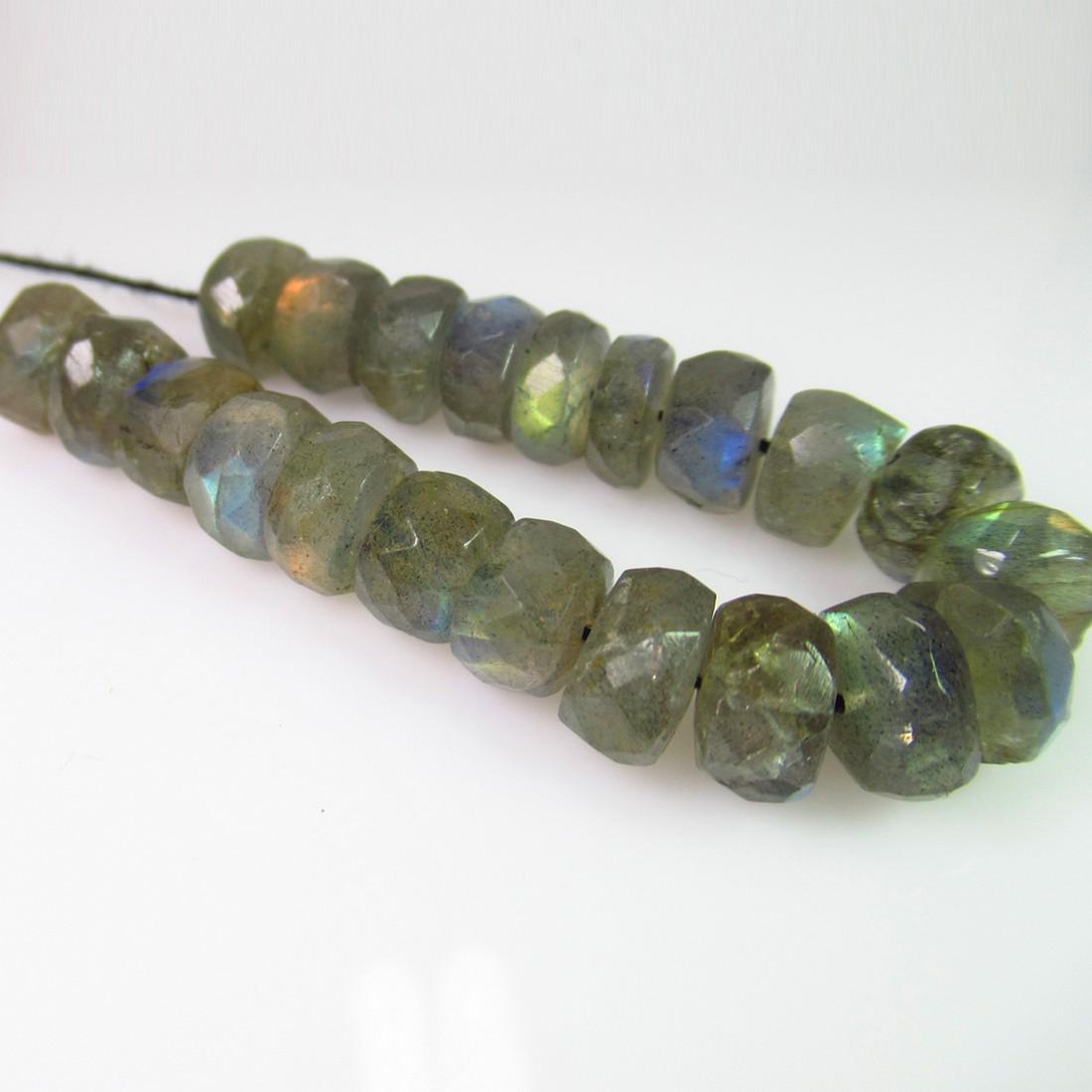 48.53 Ct Genuine 21 Labradorite Drilled Round Beads: No Reserve! Title: 48.53 Ct Genuine 21 Labradorite Drilled Round Beads Stone Clarity: Transparent Gemstones: Natural Labradorite Beads Carat Weights: 48.53 Size/Dimensions: 8.00 to 8.30 mm / 21 PC's A
