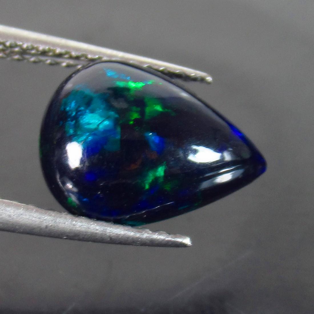 2.00 Ct Genuine Ethiopian Fire Black Opal Pear Cab (1 of 2)