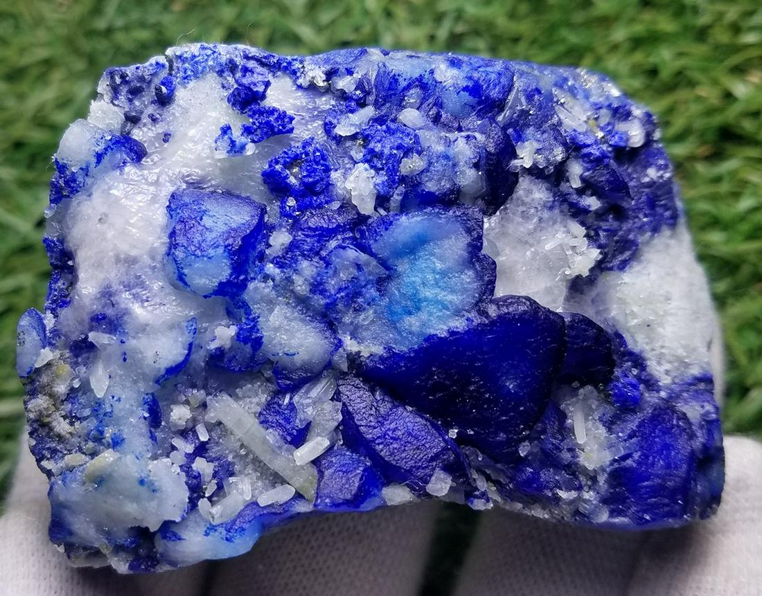 142 Grams Deep Blu Lazurite & Afghanite Combine: Title: 142 Grams Deep Blu Lazurite & Afghanite Combine Specimen Gemstones: Lazurite Carat Weights: 142 Grams Size/Dimensions: 67x50x23 MM Additional Info: Natural Reserve: $40.00 Shipping: Domestic: F