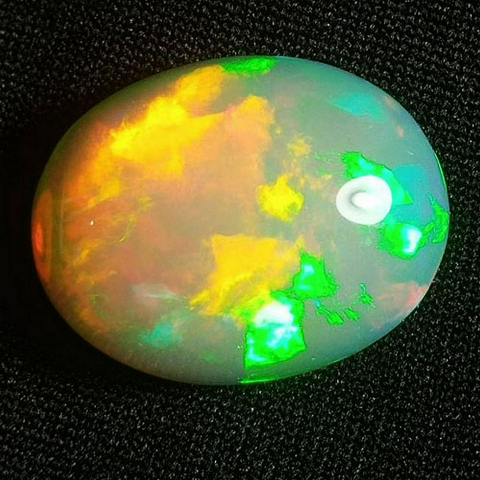 13.75 CTS NATURAL RARE WELO OPAL OVAL SHAPE LOOSE (1 of 4)