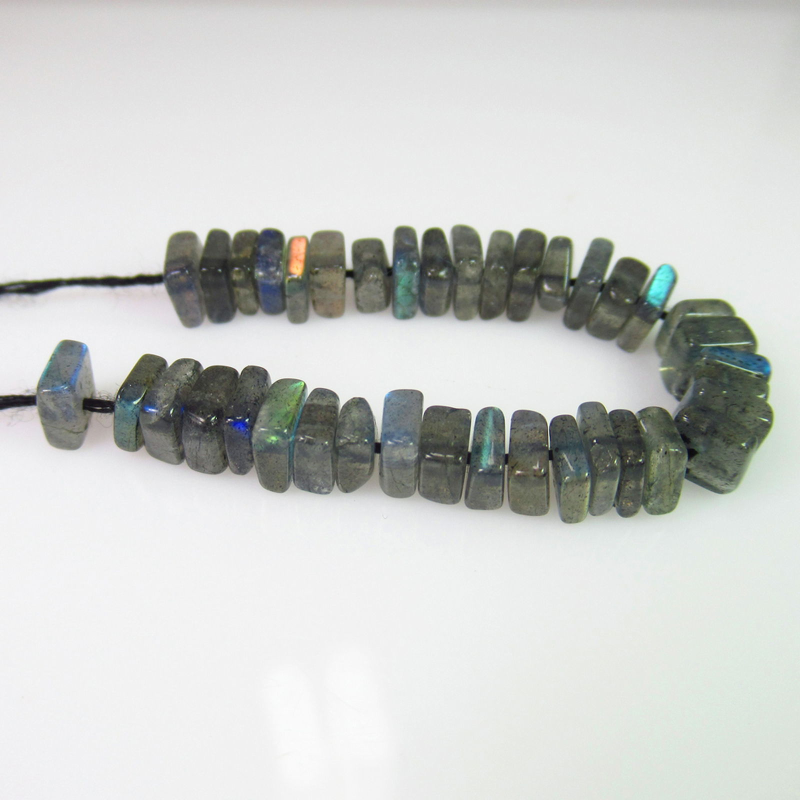 18.43 Ct Genuine 38 Labradorite Drilled Square Flat: No Reserve! Title: 18.43 Ct Genuine 38 Labradorite Drilled Square Flat Beads Stone Clarity: Transparent Gemstones: Natural Labradorite Beads Carat Weights: 18.43 Size/Dimensions: 4.5x4.5 to 5.0x5.0 mm