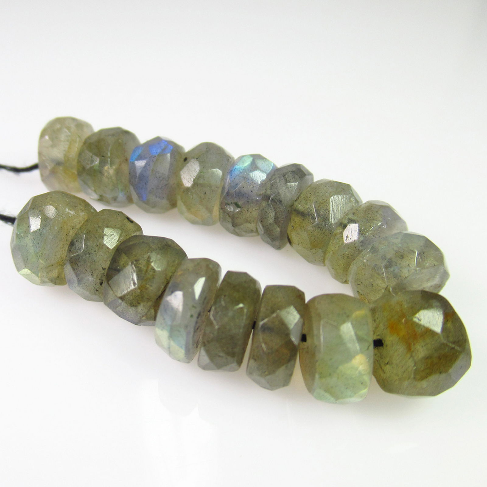 45.09 Ct Genuine 16 Labradorite Drilled Round Beads: No Reserve! Title: 45.09 Ct Genuine 16 Labradorite Drilled Round Beads Stone Clarity: Transparent Gemstones: Natural Labradorite Beads Carat Weights: 45.09 Size/Dimensions: 8.30 to 9.00 mm / 16 PC's A
