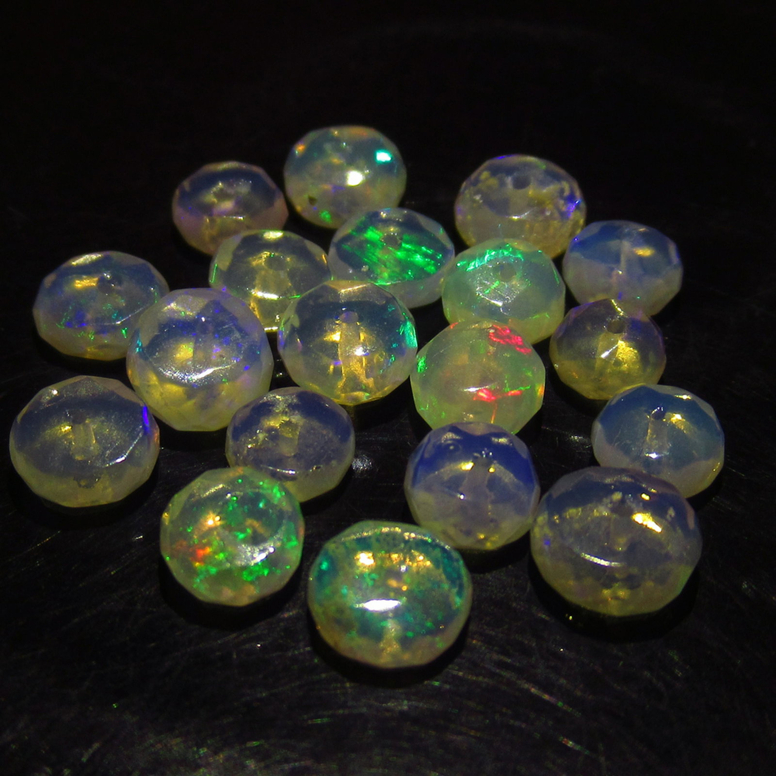 6.50 Ct Genuine 19 Drilled Round Faceted Opal Beads: No Reserve! Title: 6.50 Ct Genuine 19 Drilled Round Faceted Opal Beads Stone Clarity: Transparent Gemstones: Natural Faceted Opal Beads Carat Weights: 6.5 Size/Dimensions: 4.80 to 5.60 mm / 19 PC's Ad
