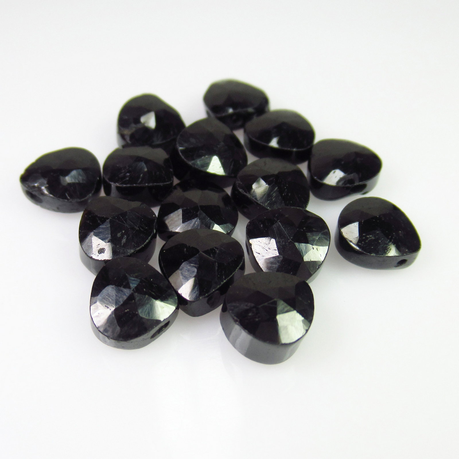 25.98 Ct Genuine 15 Drilled Black Spinel Pear Beads: No Reserve! Title: 25.98 Ct Genuine 15 Drilled Black Spinel Pear Beads Stone Clarity: Opaque Gemstones: Natural Black Spinel Beads Carat Weights: 25.98 Size/Dimensions: 6.8x6.5 to 6.9x6.8 mm / 15 PC's