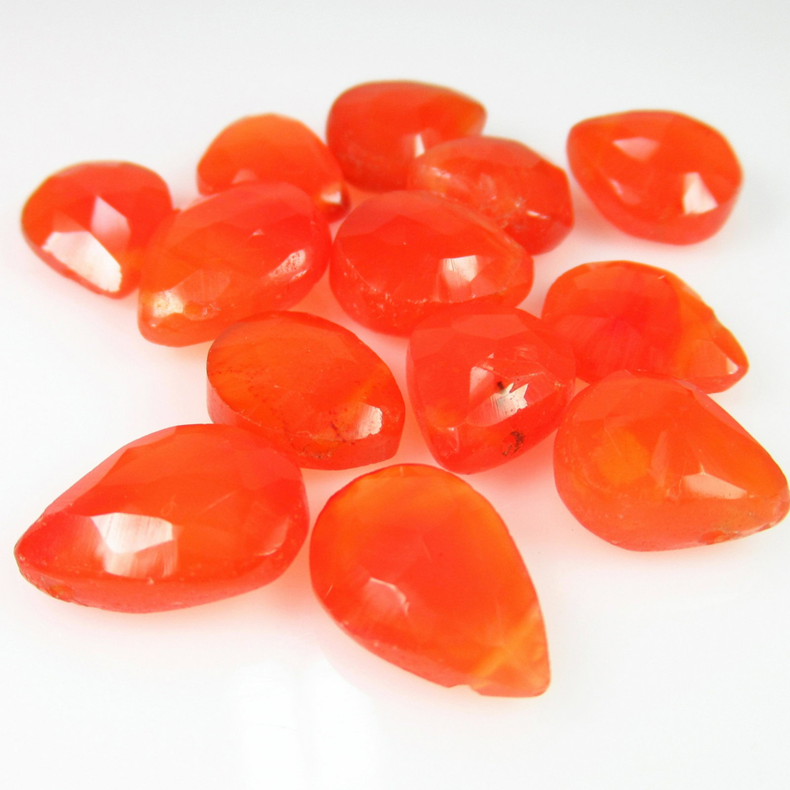 46.55 Ct Genuine 13 Orange Carnelian Drilled Pear Beads: No Reserve! Title: 46.55 Ct Genuine 13 Orange Carnelian Drilled Pear Beads Stone Clarity: Transparent Gemstones: Natural Carnelian Beads Carat Weights: 46.55 Size/Dimensions: 10.6x8.7 to 13.1x10.8 mm 