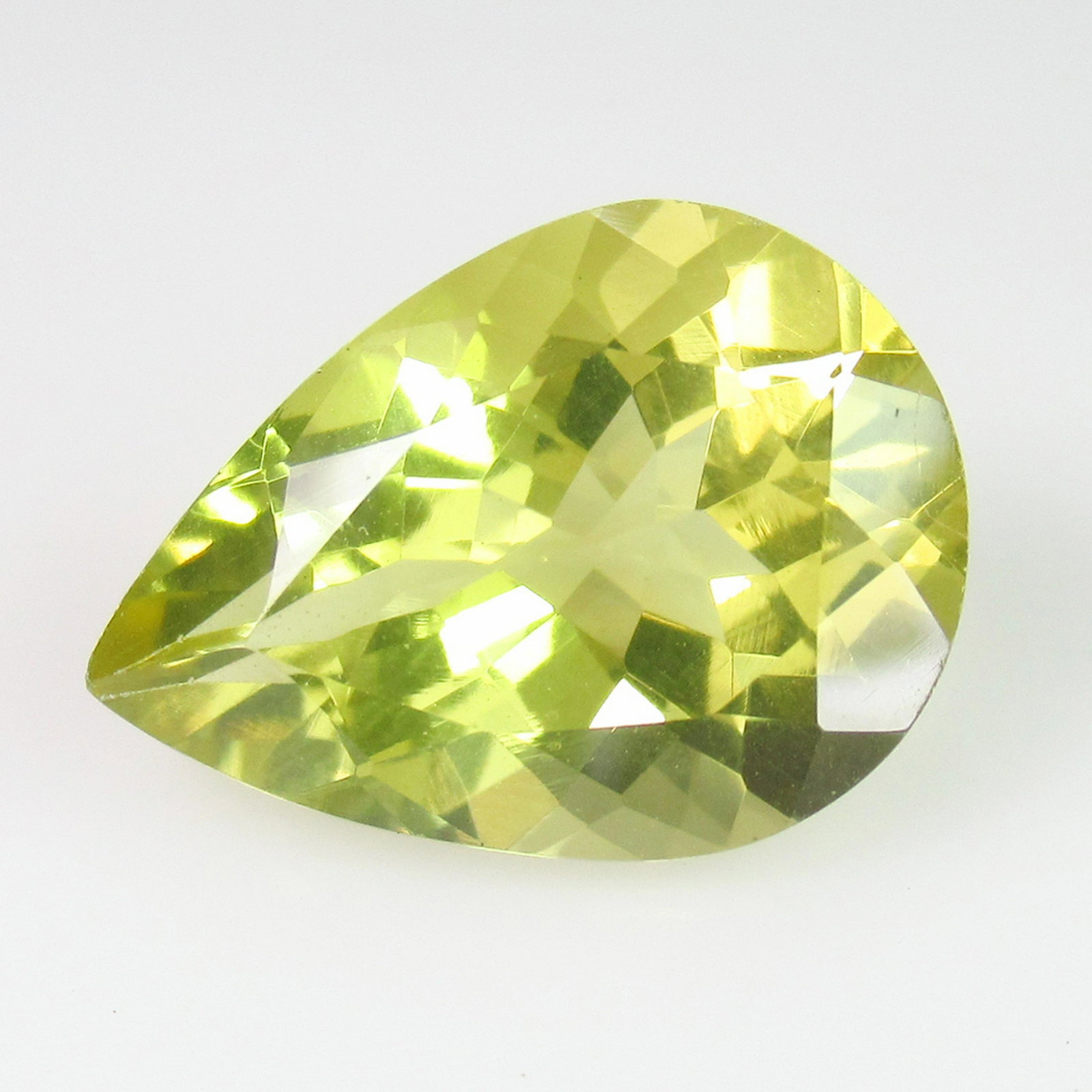 9.30 Ct Genuine Lemon Quartz 18X13 mm Pear Cut: No Reserve! Title: 9.30 Ct Genuine Lemon Quartz 18X13 mm Pear Cut Stone Clarity: VVS Gemstones: Natuarl Lemon Quartz Carat Weights: 9.3 Size/Dimensions: 17.90 x 12.90 x 8.60 mm Additional Information: