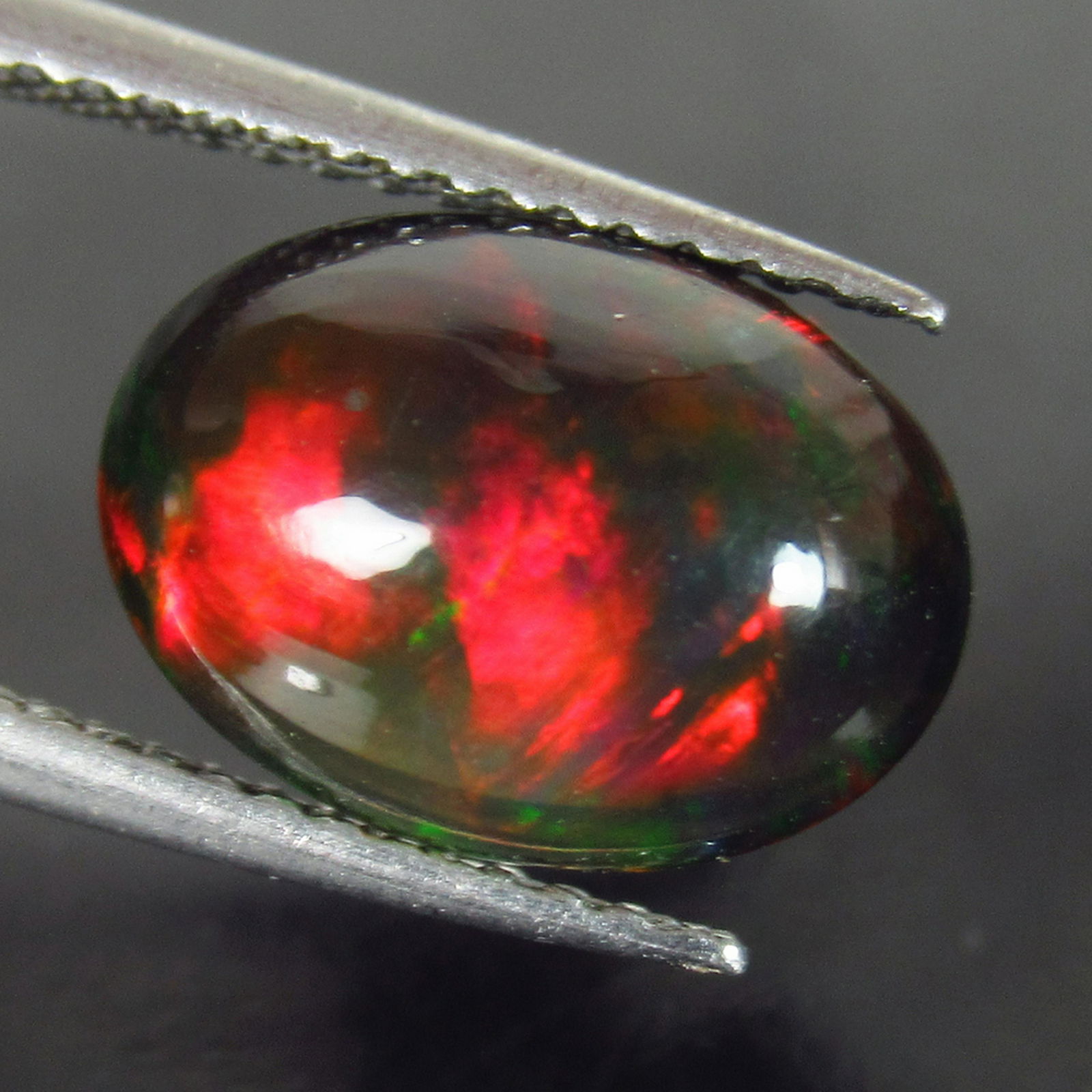 2.21Ct Genuine Unheated Fire Black Opal Oval Cab (1 of 2)