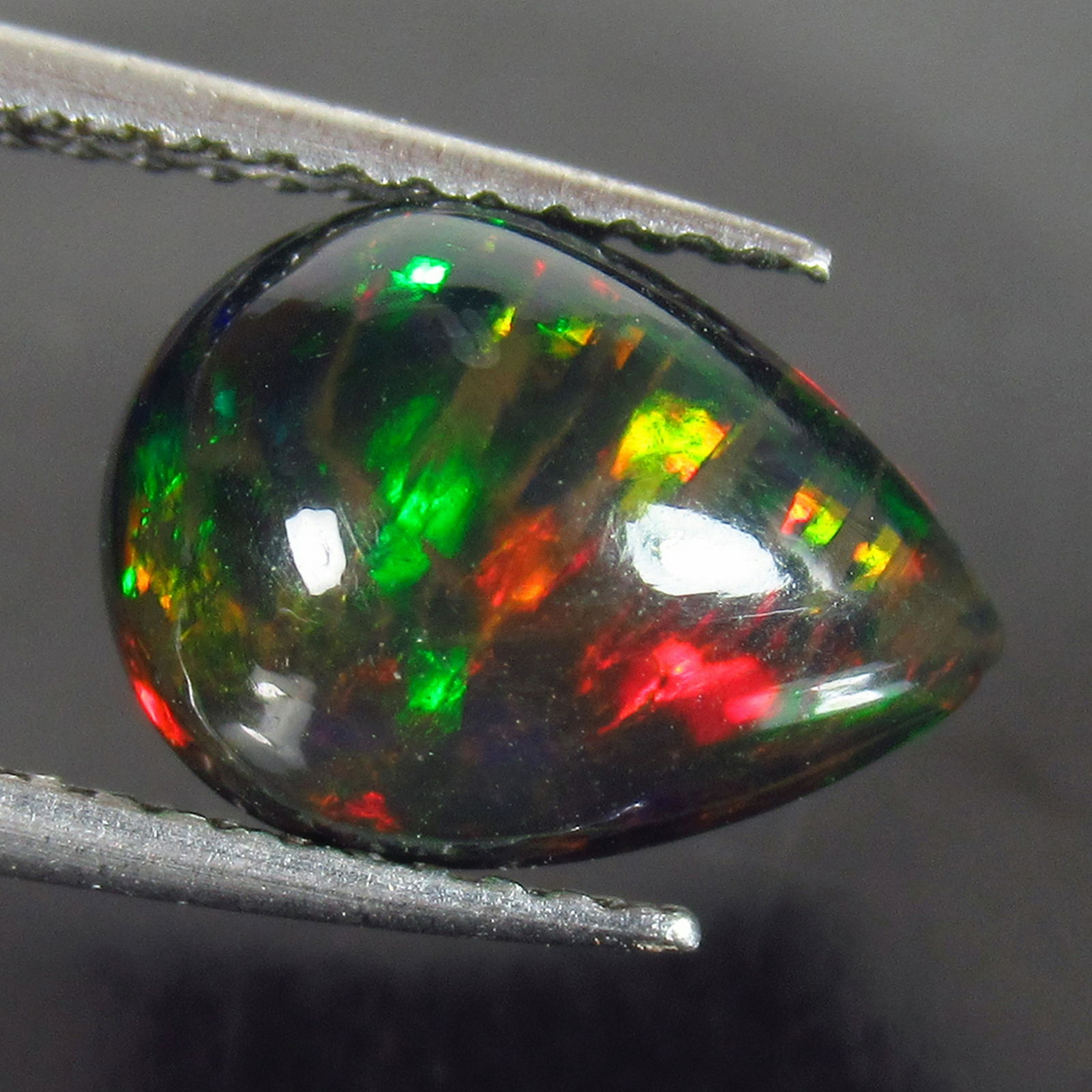 1.97 Ct Genuine Ethiopian Fire Black Opal Pear Cab (1 of 2)