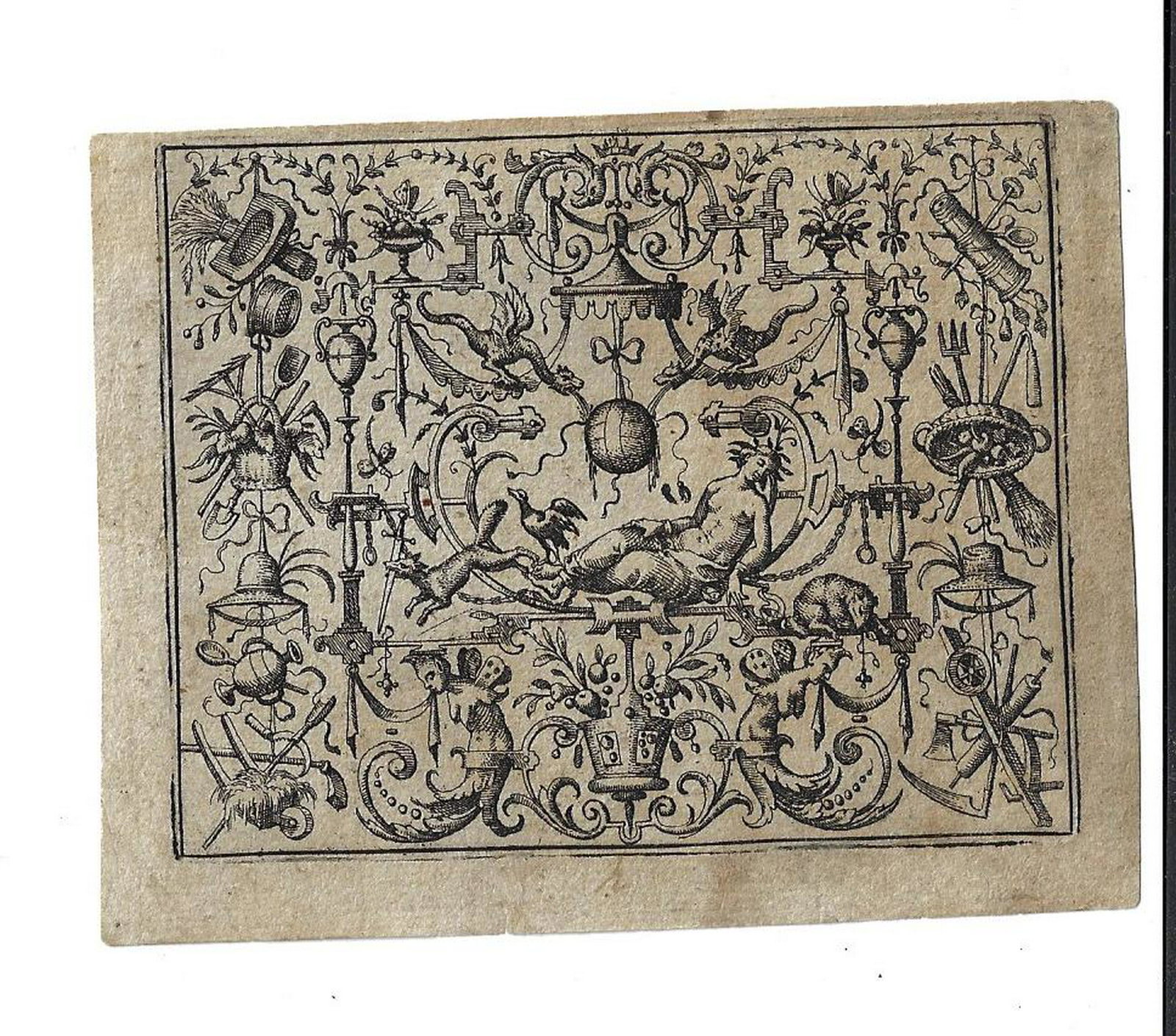 1566 Engraving Du Cerceau Petit Grotesques: An engraving of Jacques Du Cerceau (1510-1581) circa 1566 from his series of Petit Grotesques. Beautiful design laid on paper, Fine, 4 x 3.5”. Reserve: $25.00 Shipping: Domestic: Flat-rate of $5.00 
