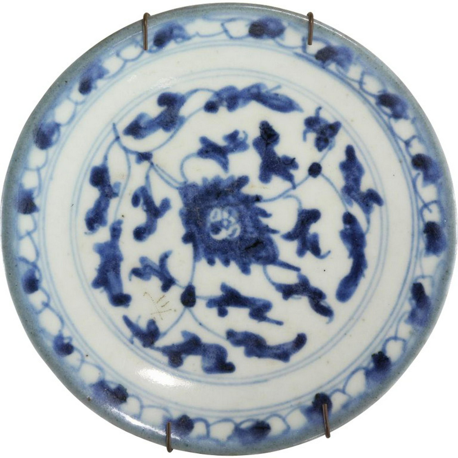 Blue And White Plate | Nanking Cargo 1752 | Ming Qing: A lovely blue and white porcelain dish / plate, decorated with a traditional scrolling lotus pattern, China late Ming - early Qing dynasty (Ching) 17th - 18th Century.The plate is part of the famous "
