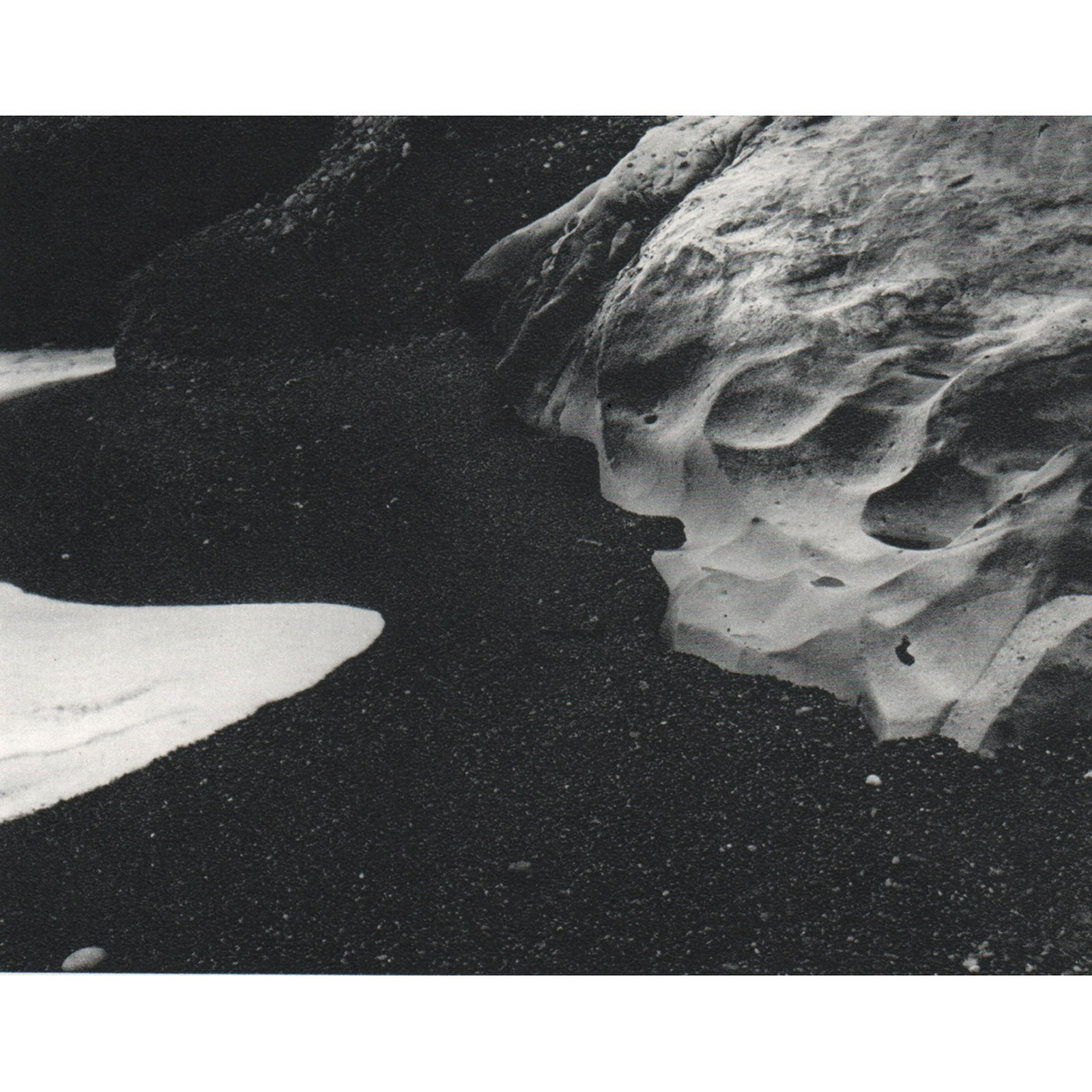 MINOR WHITE - Black Sand: Artist: MINOR WHITE Print Title: Black Sand Medium: Sheet-fed Gravure Printing Date: 1970's Printed in Switzerland Image Size: 4.5 X 3.5 inches Minor Martin White (1908-1976) was an American photograp