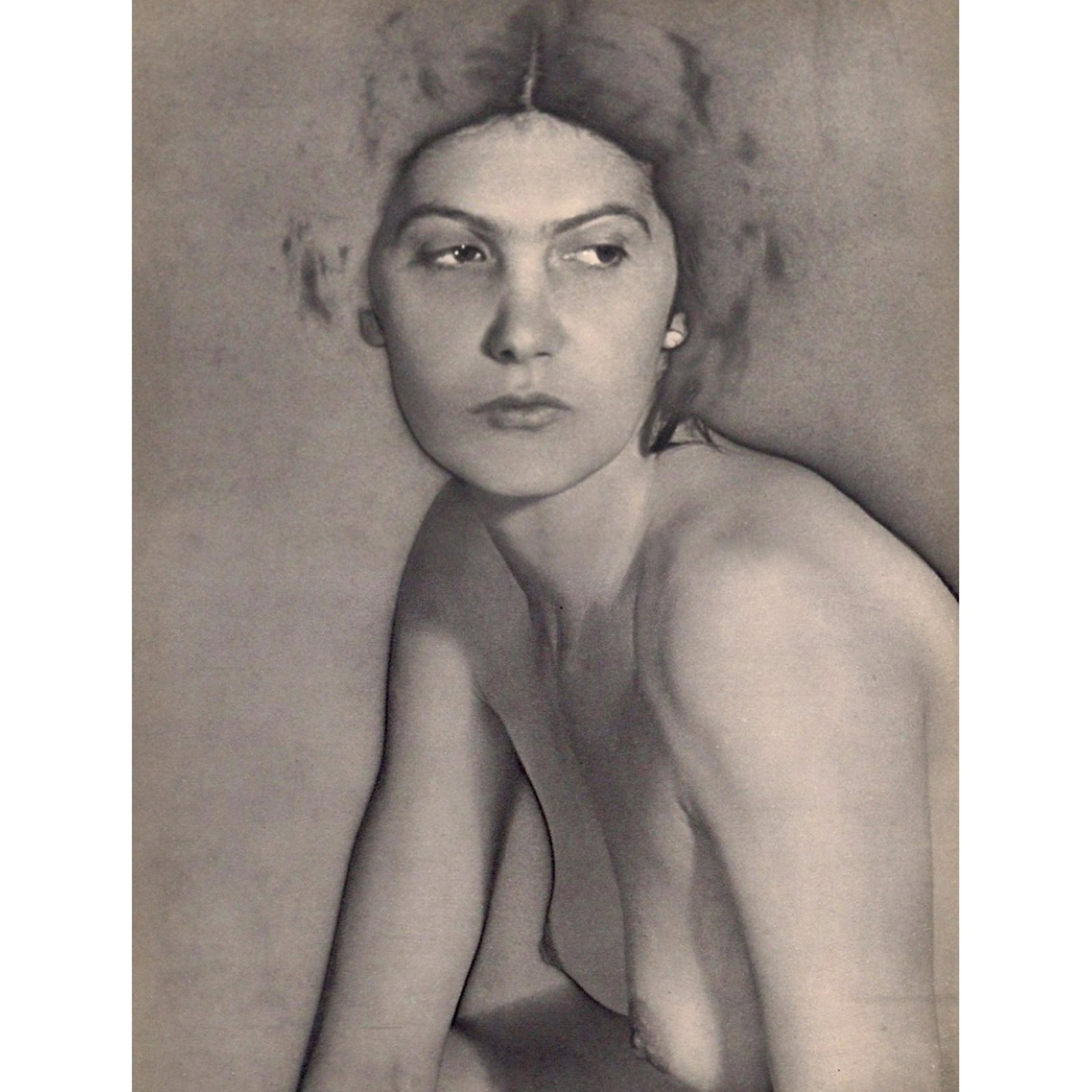 MAN RAY - Nude: Artist: MAN RAY Print Title: Nude Medium: Sheet-fed Gravure Printing Date: 1930's Printed in France Image size approx: 8.5 x 11.5 inches Man Ray, original name Emmanuel Radnitzky, was born on August 2