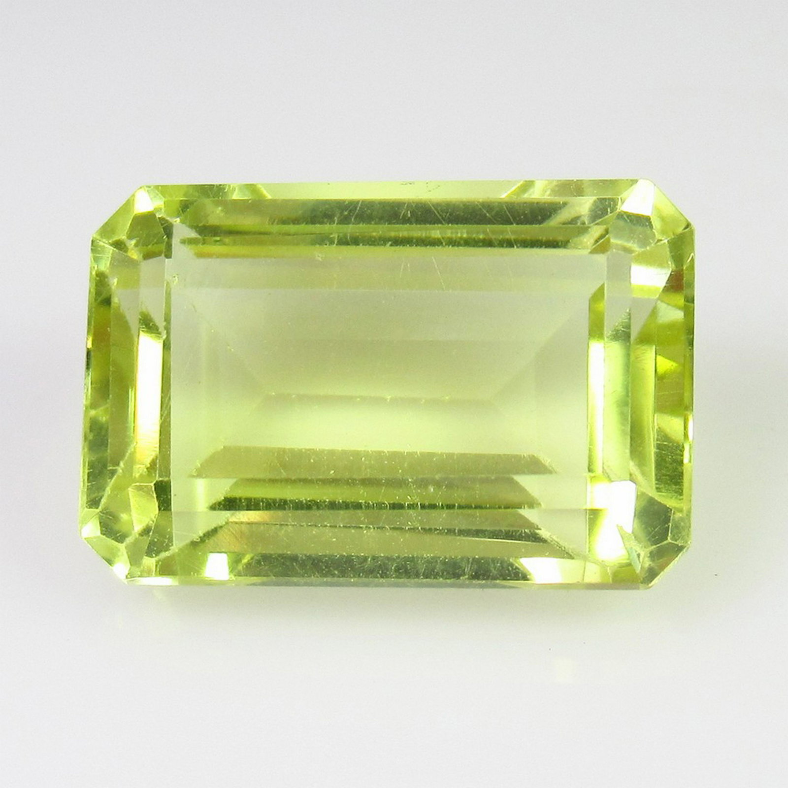 13.57 Ctw Natural Lemon Quartz Octagon Cut: Title: 13.57 Ctw Natural Lemon Quartz Octagon Cut Stone Clarity: VVS Gemstones: Lemon Quartz Carat Weights: 13.57 Size/Dimensions: 17.10 x 11.50 x 8.70 mm Additional Information: Good Luster / Top Cla