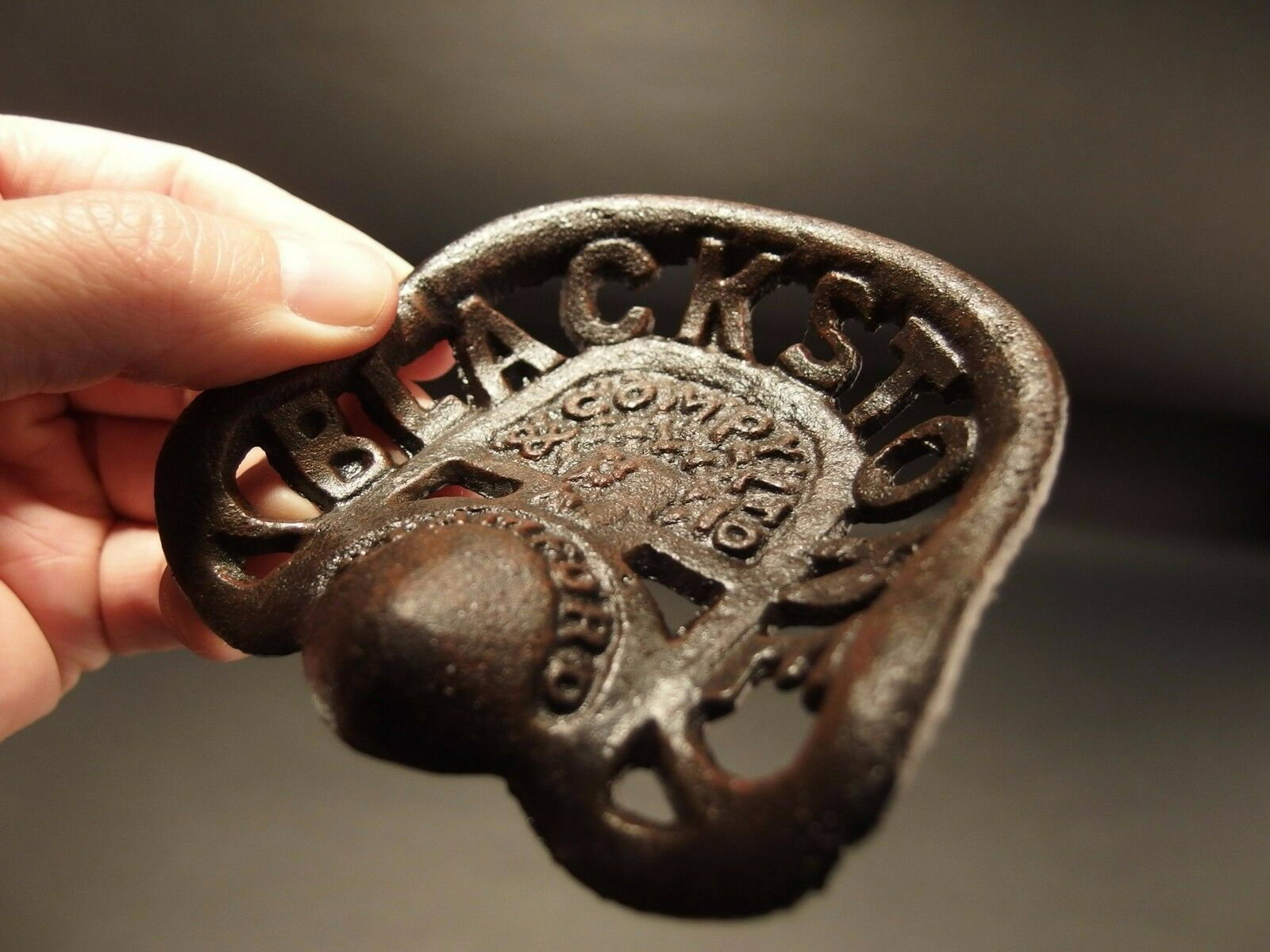 Mini Blackstone Cast Iron Farm Tractor Seat Paperweight: 4 1/8" x 3 1/2" Great reproduction antique folk art cast iron tractor seat. This piece was cast to look just like the larger version likely as a salesman sample. Makes a great paperweight for any coll