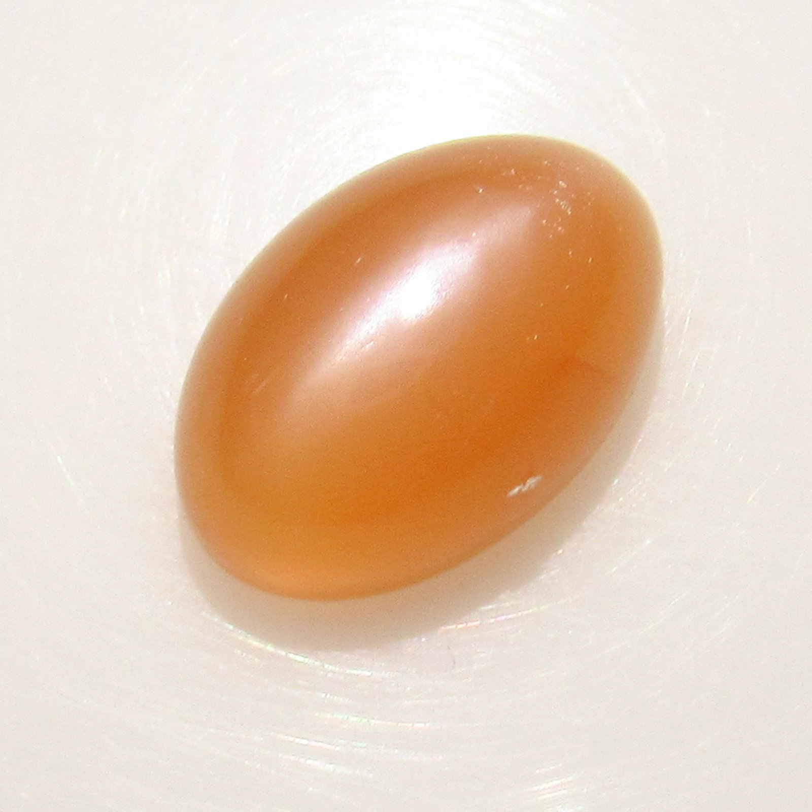 4.79 Ctw Natural Orange Moonstone Catseye Oval Cab: No Reserve! Title: 4.79 Ctw Natural Orange Moonstone Catseye Oval Cab Stone Clarity: Transparent Gemstones: Moonstone Catseye Carat Weights: 4.79 Size/Dimensions: 12.40 x 8.30 x 6.30 mm Additional Inf
