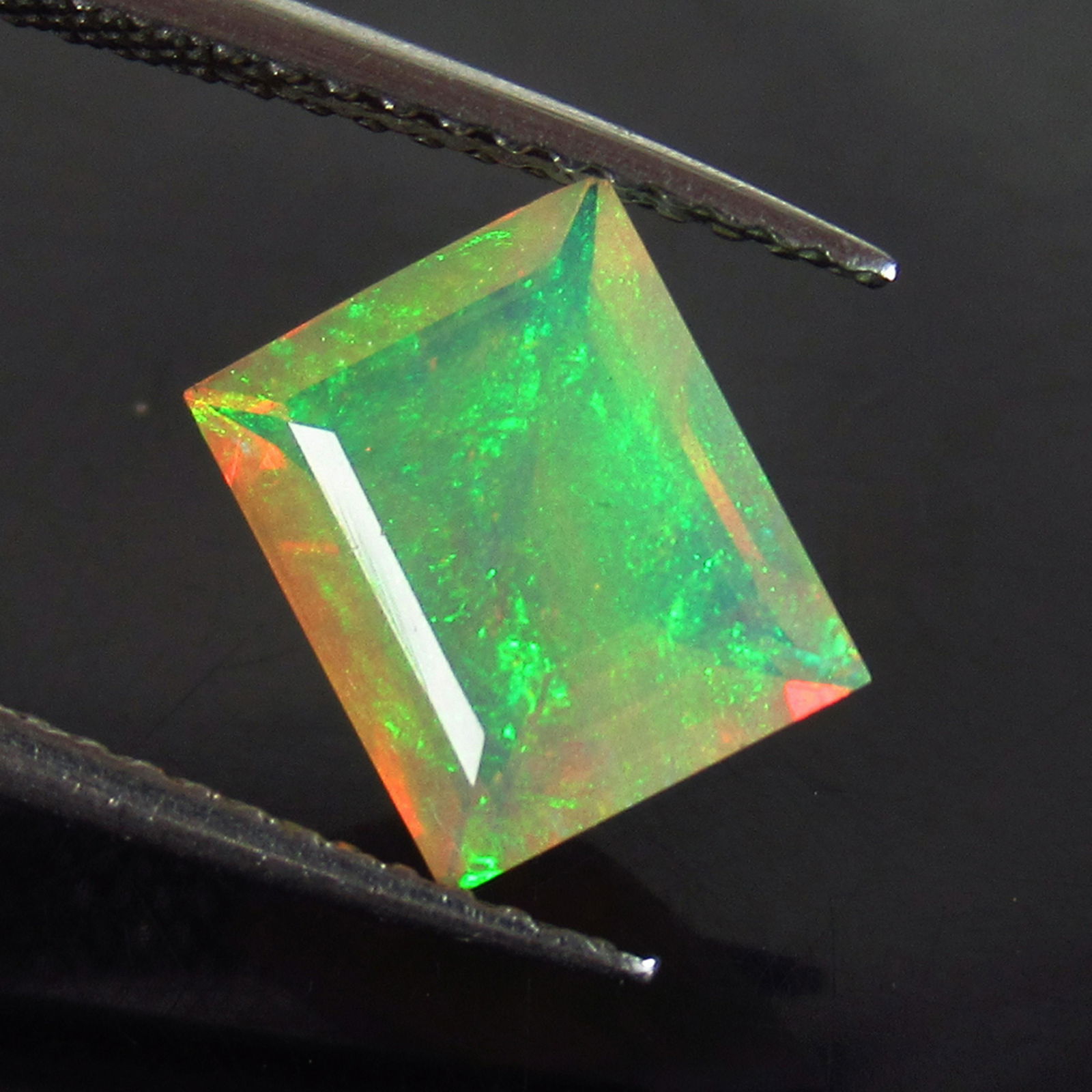 1.24 Ct Genuine Multi-Color Fire Faceted Opal Octagon (1 of 2)