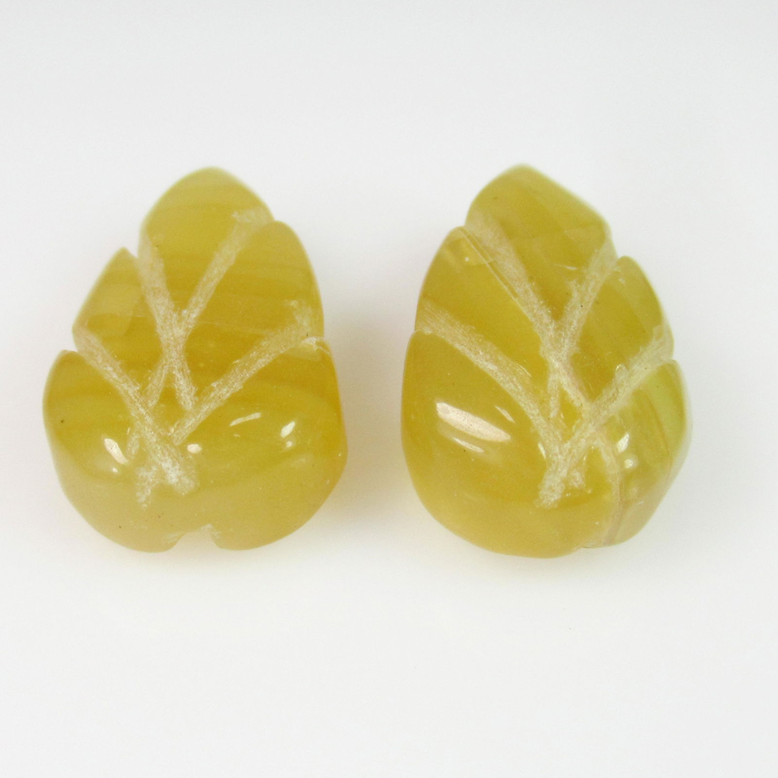 15.77 Ct Genuine Drilled Yellow Opal Leaf Carving Pair (1 of 2)