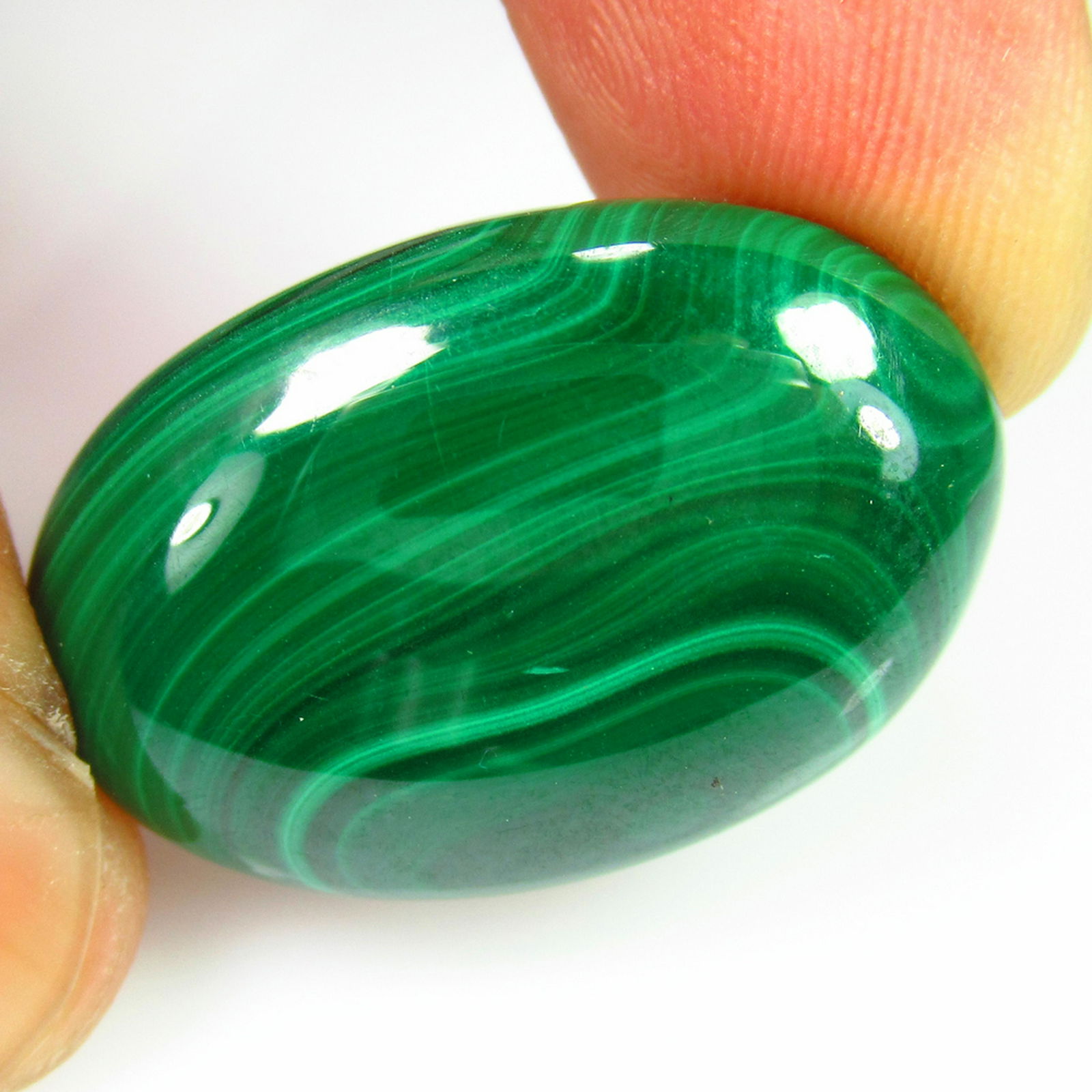 37.37 Ct Genuine Green Malachite 27X17.5 mm Oval Cab: No Reserve! Title: 37.37 Ct Genuine Green Malachite 27X17.5 mm Oval Cab Stone Clarity: Opaque Gemstones: Natural Malachite Carat Weights: 37.37 Size/Dimensions: 27.00 x 17.40 x 6.60 mm Additional Info