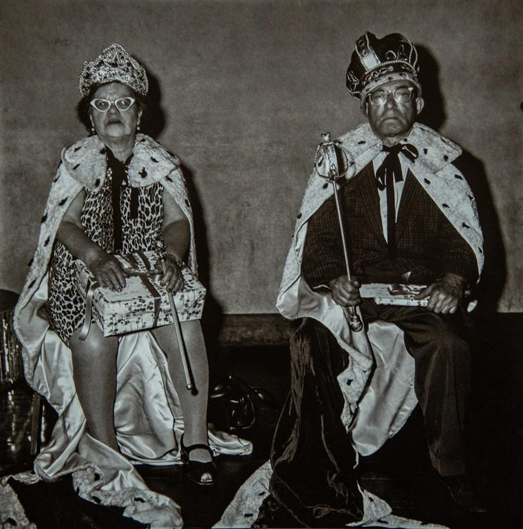DIANE ARBUS - The King and Queen, Senior Citizens: Artist: Diane Arbus Title: The King and Queen, Senior Citizens Dance, NYC, 1970 Medium: Photo Litho, 1972, USA Dimensions: 8.25x8.45" Heat Wax Mounted on 11x14" Conservation Board Diane Arbus was an A