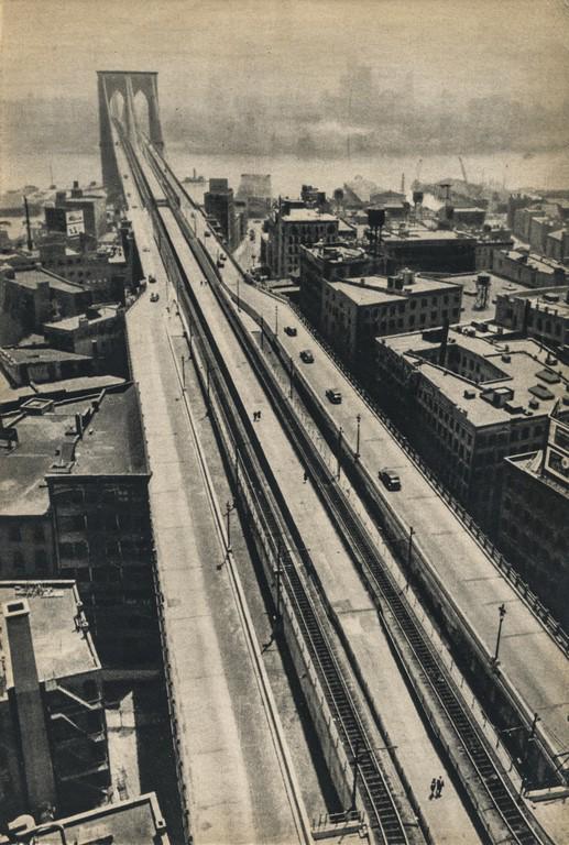 HENRI CARTIER-BRESSON - The Brooklyn Bridge, 1940s: Artist: Henri Cartier-Bresson Title: The Brooklyn Bridge, 1940s Medium: Sheet Fed Gravure, 1949, France Dimensions: 6.35x9.4" Heat Wax Mounted on 11x14" Conservation Board Henri Cartier-Bresson was a 