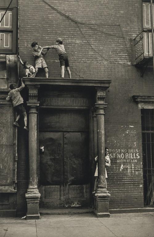 HELEN LEVITT - Kids Play, NYC, 1939: Artist: Helen Levitt Title: Kids Play, NYC, 1939 Medium: Photo Litho, 1991, USA Dimensions: 5.5x8.45" Heat Wax Mounted on 8.5x11" Conservation Board Helen Levitt (1913 - 2009) was an American photogra