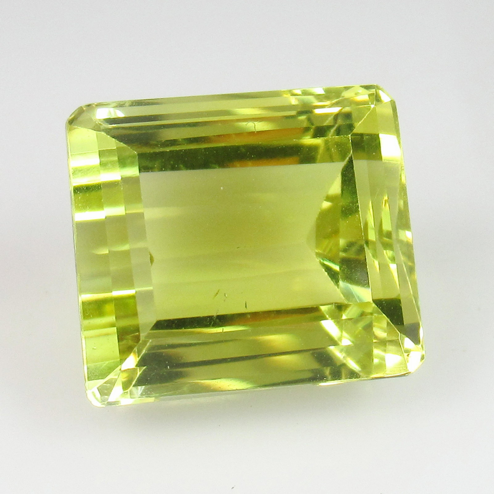 14.86 Ctw Natural Yellow Lemon Quartz Octagon Cut: Title: 14.86 Ctw Natural Yellow Lemon Quartz Octagon Cut Stone Clarity: VVS Gemstones: Lemon Quartz Carat Weights: 14.86 Size/Dimensions: 13.70 x 12.20 x 10.70 mm Additional Information: Good Luster /
