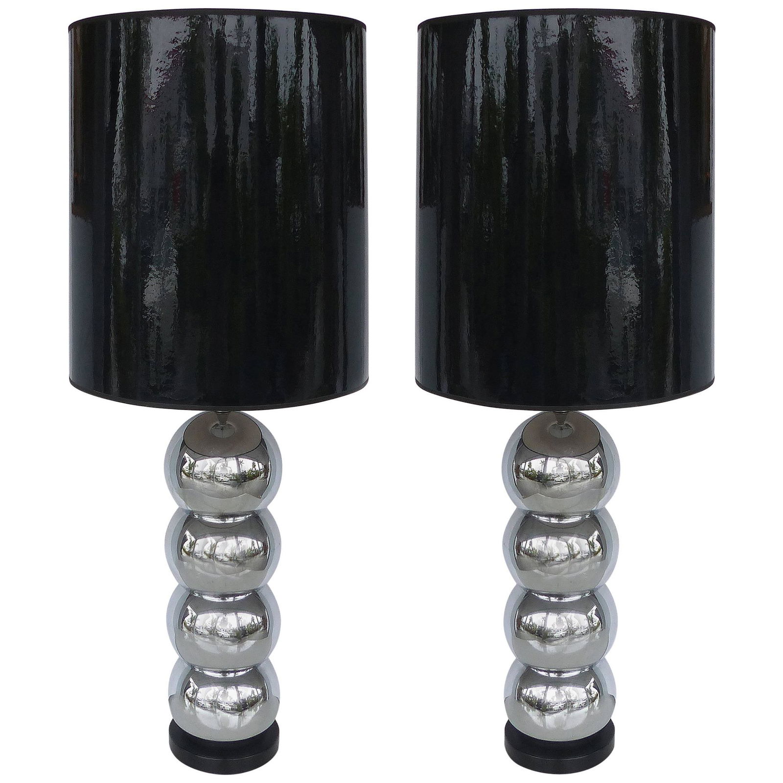 George Kovacs Stacked Ball Table Lamps with Gloss: George Kovacs Stacked Ball Table Lamps with Gloss Shades, Pair Offered for sale is a pair of George Kovacs stacked ball lamps in chrome with dramatic tall gloss black paper drum shades. The chrome is