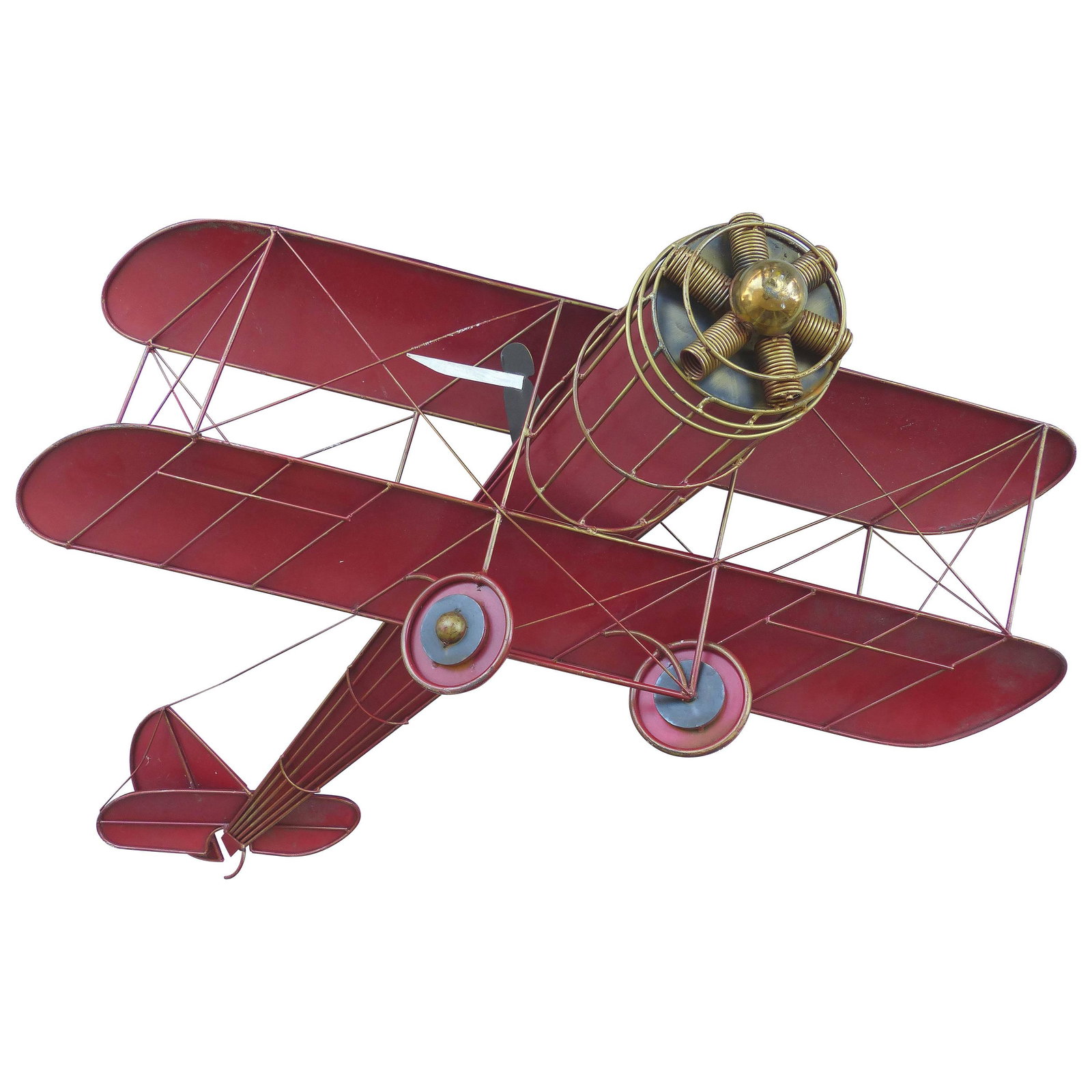 Large Three Dimensional Iron and Brass Wall Sculpture: Large Three Dimensional Iron and Brass Wall Sculpture of an Airplane in Flight Offered for sale in a three dimensional iron and brass wall sculpture of a biplane in flight. Unsigned but in the manner 