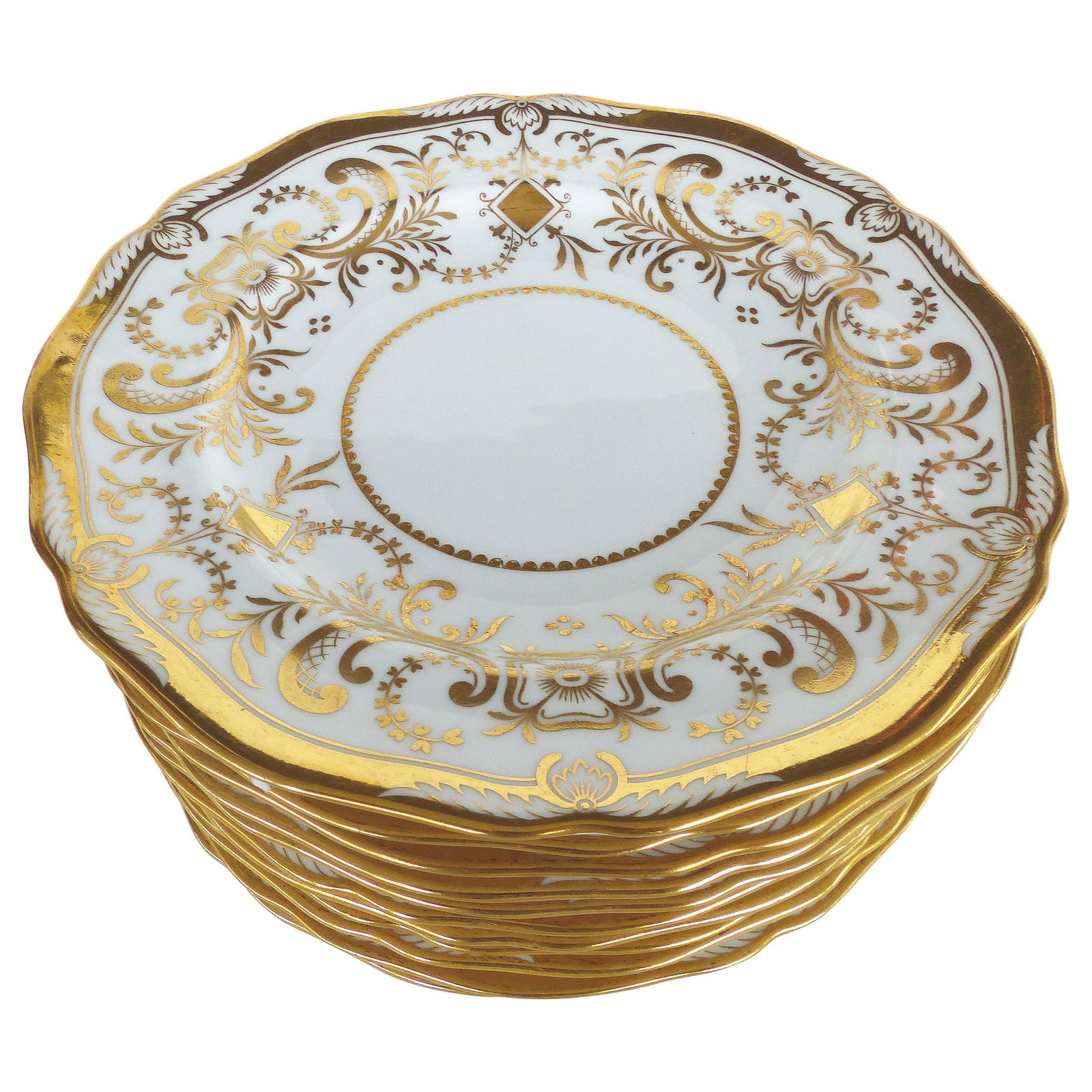 Copeland Spode Gilt Decorated Dessert Plates, Set of 11: Copeland Spode Gilt Decorated Dessert Plates, Set of 11 Retailed by WH Plummer Offered for sale is a set of 11 dessert plates by Copeland Spode England, retailed by W.H. Plummer & Co. Ltd. in New York