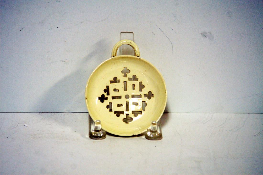A Late 18th Century English Cream Ware Tea Strainer (1 of 1)