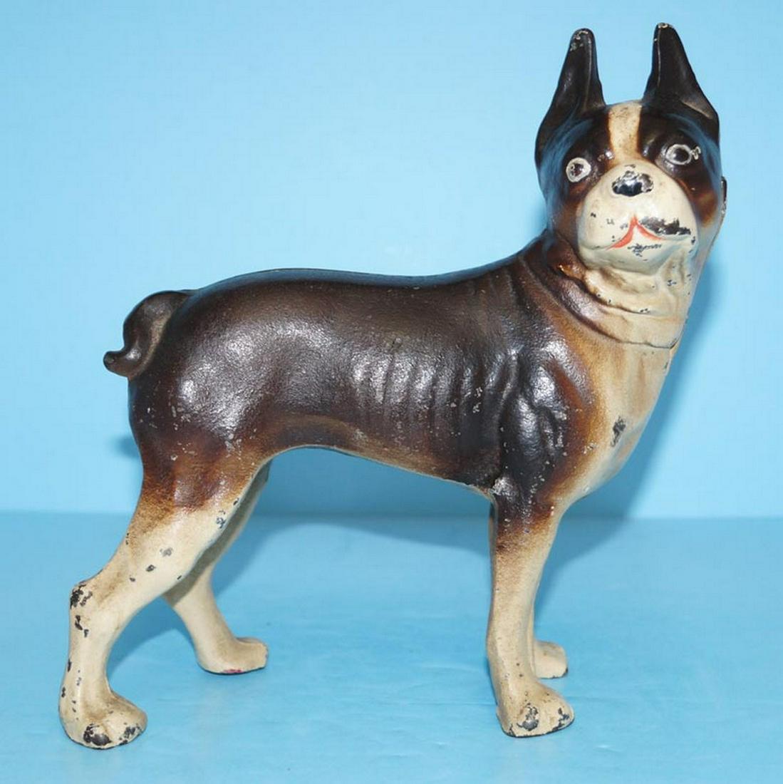 Antique Boston Terrier Dog Cast Iron Doorstop: Title: Antique Boston Terrier Dog Cast Iron Doorstop Date/Period: Circa 1930's. Dimension: 8 3/4" H. x 8 1/8" L. w 3" W. Provenance:Full-figure & in standing position, facing right. Please note that t