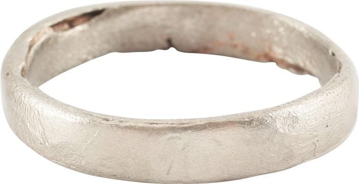 VIKING WEDDING RING 850-950 AD SIZE 8 ¼.: Silvered bronze, size 10 1/4. Provincially-crafted with low rounded face. The edges and inside with evidence of having been cast as a solid disk with the center hand carved out. It is thought that V
