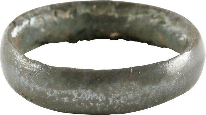 VIKING WEDDING RING, 850-1050 AD SIZE 6: No Reserve! Bronze, size 6. Broad band with rounded face. Made with a solid disk center to distribute the molten metal in the mold. The disk laboriously removed after the casting cooled with remnants 