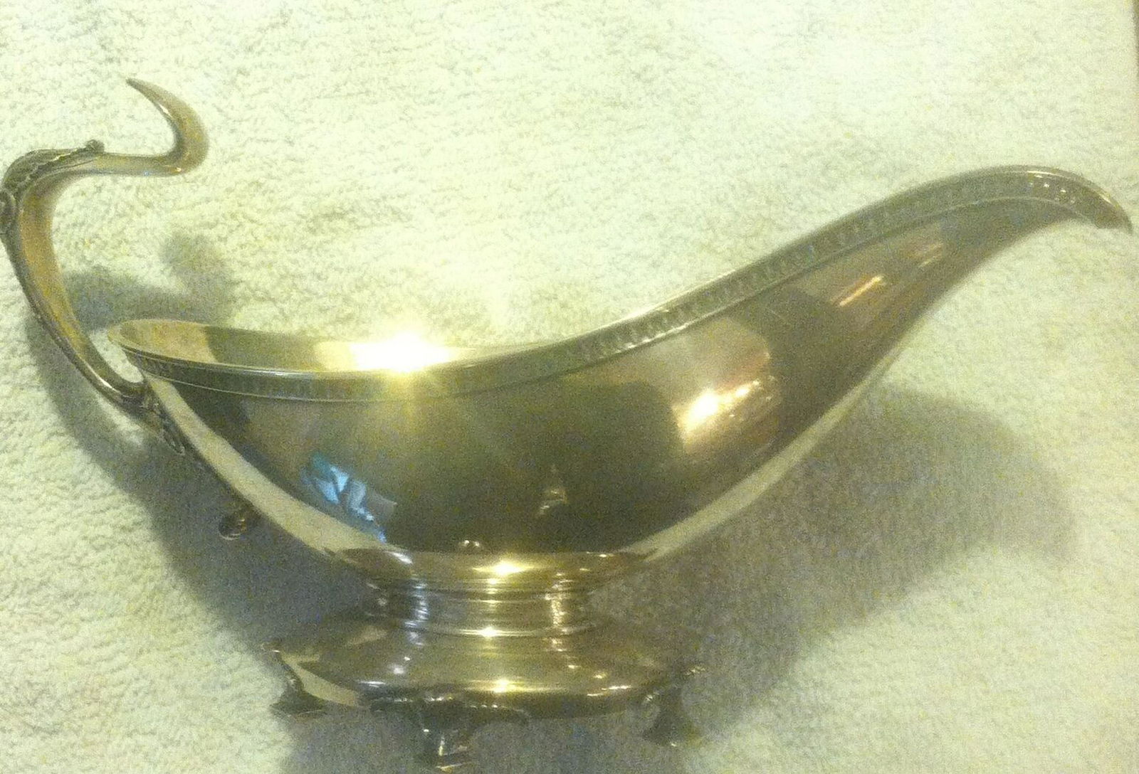 Tiffany Sterling Silver Gravy/Sauce Boat Egyptian: Tiffany & Co. Union Square Gravy Boat This is a wonderful early Tiffany & Company sterling gravy or sauce boat with Egyptian Revival decorative motif. It is approximately 6 inches tall to top of the h