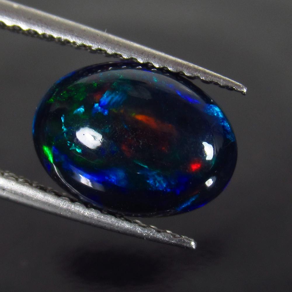 1.67 Ct Genuine Ethiopian Fire Black Opal Oval Cab (1 of 2)