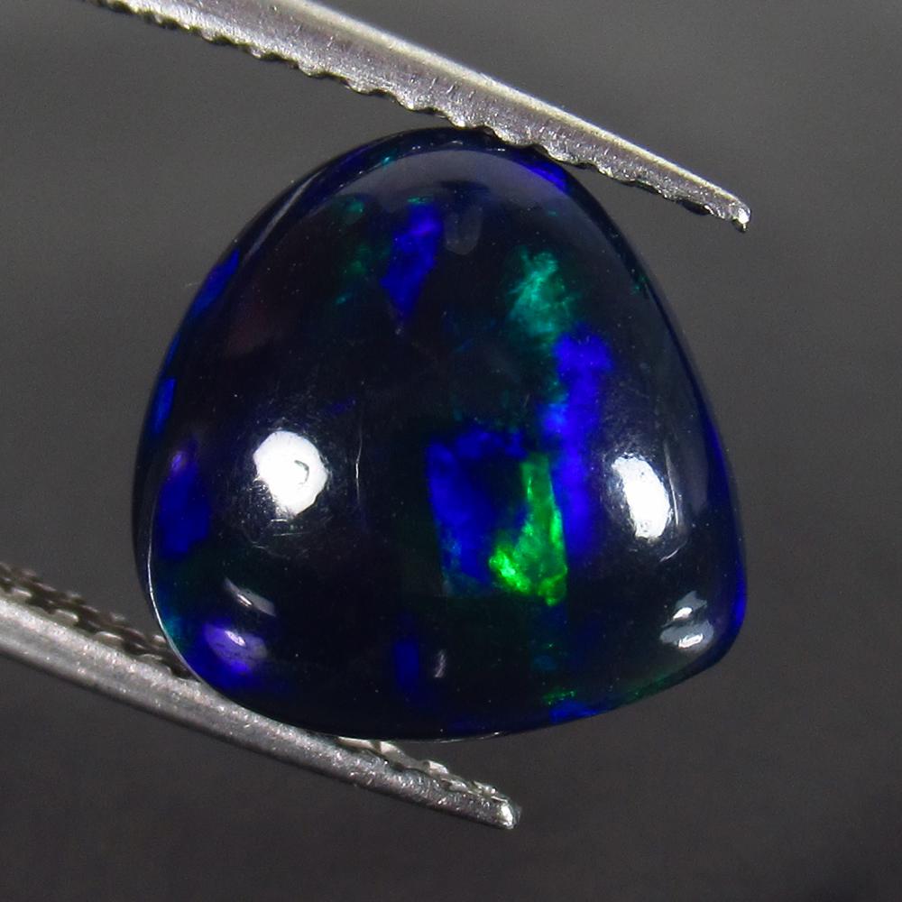 2.02 Ct Genuine Ethiopian Fire Black Opal Pear Cab (1 of 2)