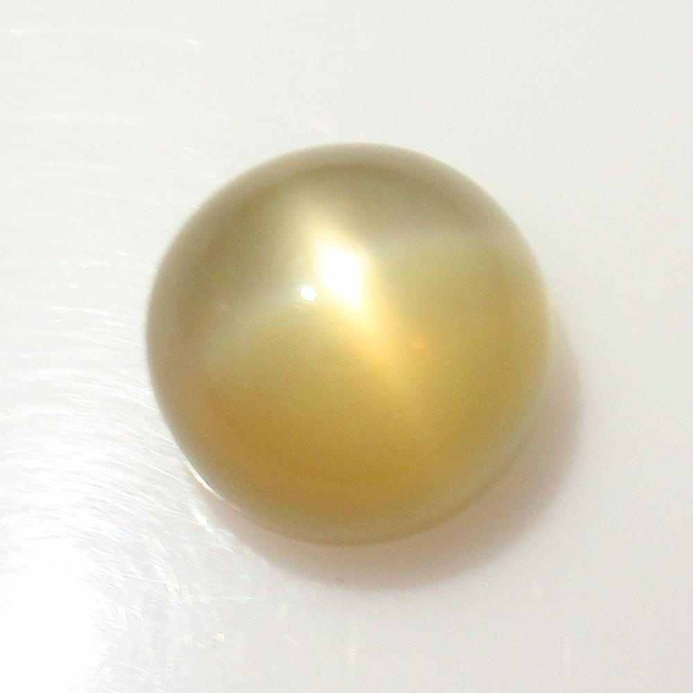 9.22 Ct Genuine Moonstone Catseye 12 mm Round: No Reserve! Title: 9.22 Ct Genuine Moonstone Catseye 12 mm Round Stone Clarity: Transparent Gemstones: Natural Moonstone Catseye Carat Weights: 9.22 Size/Dimensions: 12.00 x 12.00 x 8.40 mm Additional