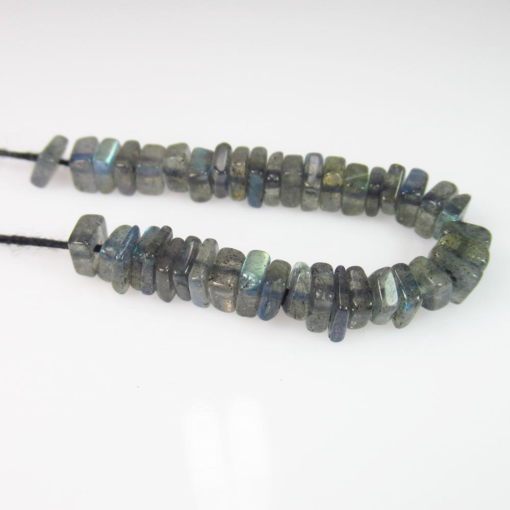 14.76 Ct Genuine 44 Labradorite Drilled Square Beads: No Reserve! Title: 14.76 Ct Genuine 44 Labradorite Drilled Square Beads Stone Clarity: Transparent Gemstones: Natural Labradorite Beads Carat Weights: 14.76 Size/Dimensions: 4.10 to 4.40 / 44 PC's Add
