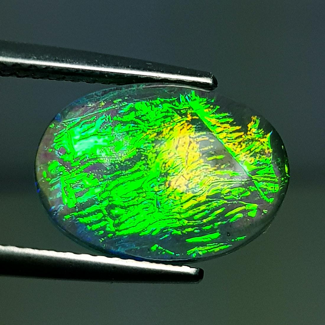 Australian Doublet Opal 5.95 ct: No Reserve! Title: Australian Doublet Opal 5.95 ct Color/Clarity: Semi Transparent Gemstones: Loosegemstone Carat Weights: $6 Size/Dimensions: 14.10 x 10.10 x 5.50 Additional Information: Oval - Austr