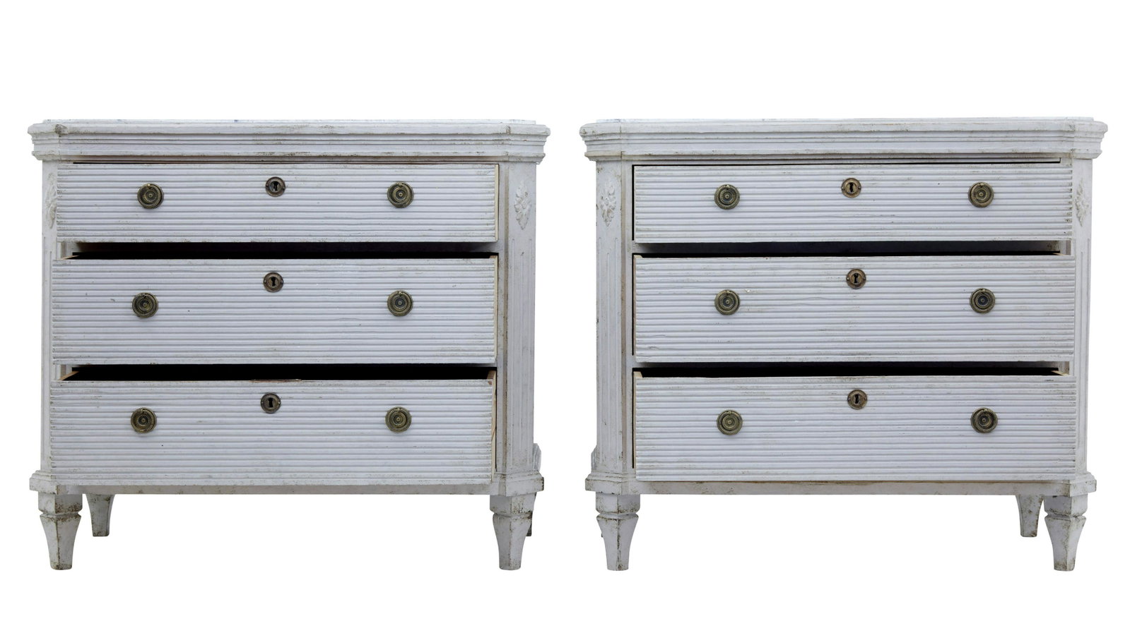 PAIR OF PAINTED 19TH CENTURY SWEDISH CHEST OF DRAWERS: Description:Fine pair of Gustavian influenced Swedish commodes circa 1860. 3 drawers with fluted detailing to the front. Later brass ring handles. Faux marble painted top. Later paint.; Height: 30 1/4