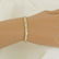 10k YELLOW GOLD XO 1/10ct ROUND DIAMOND MESH LINK - 10