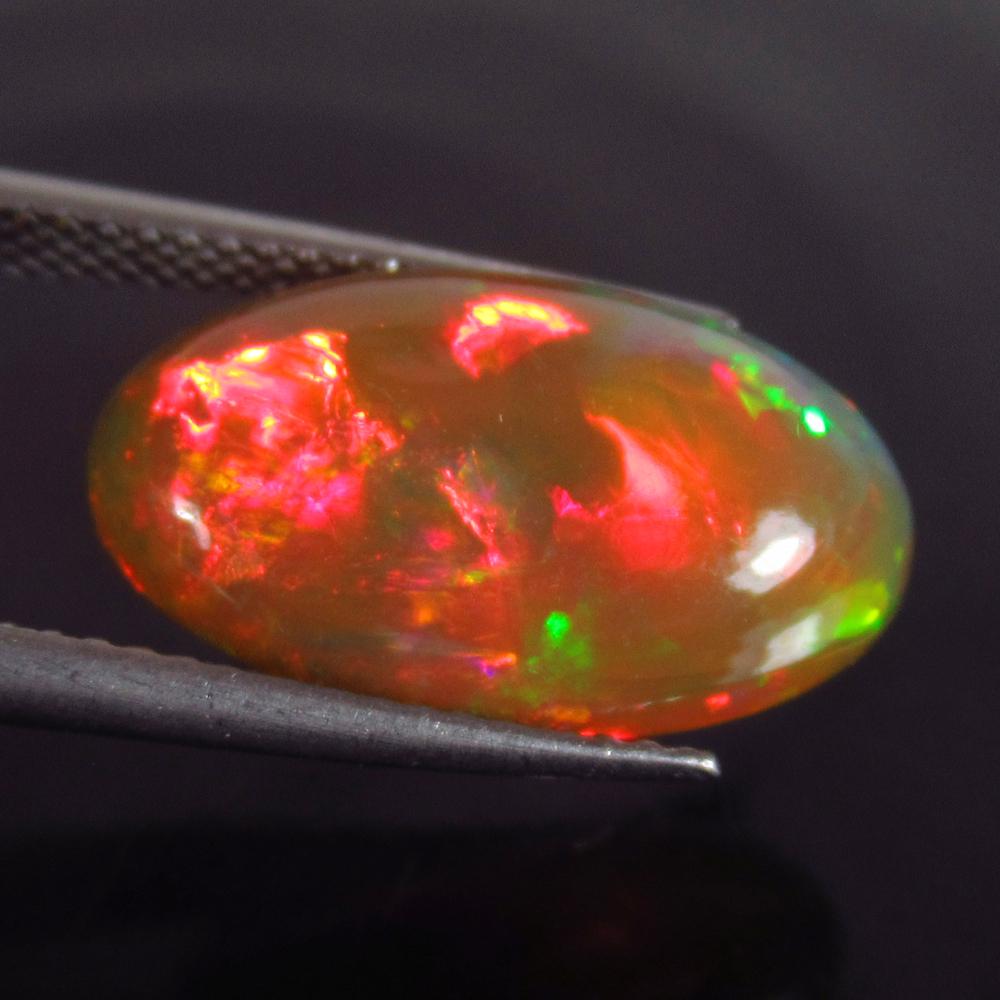 4.76 Ct Genuine Ethiopian Multi-Color Fire Opal Oval (1 of 2)